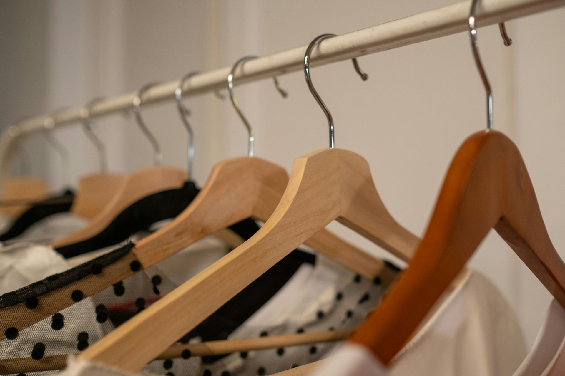A close up on Hangers with Clothes